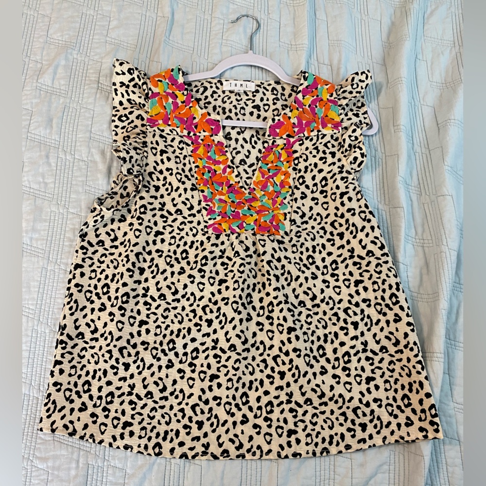 Women’s embroidered cheetah print blouse Brand is THML